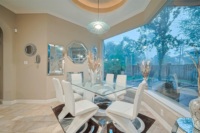 122 Marble Staff Ct, Houston, TX 77069 - dining room with arched walkways, ornamental molding, healthy amount of natural light, and baseboards