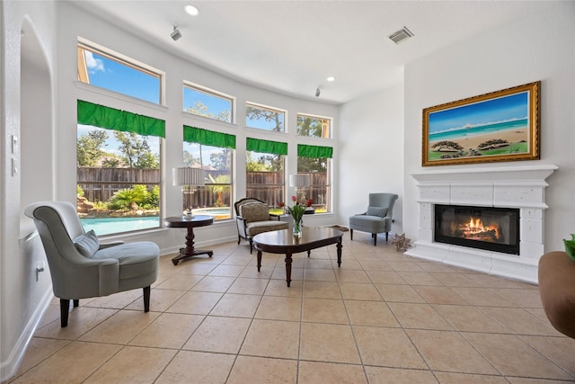 15306 Clearhaven Ct, Cypress, TX 77429 - sitting room with light tile patterned floors, visible vents, and a healthy amount of sunlight