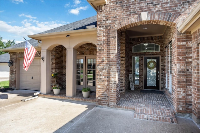15306 Clearhaven Ct, Cypress, TX 77429 - entrance to property with driveway, brick siding, french doors, an attached garage, and roof with shingles