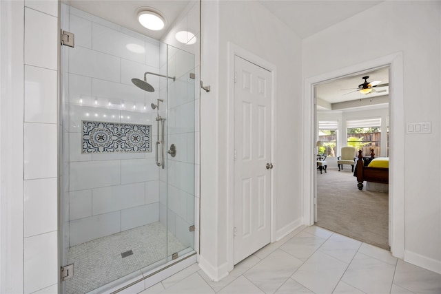 15306 Clearhaven Ct, Cypress, TX 77429 - bathroom featuring connected bathroom, a shower stall, baseboards, and a ceiling fan