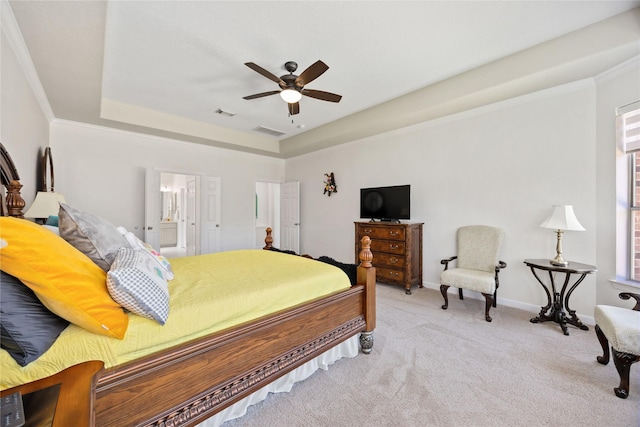 15306 Clearhaven Ct, Cypress, TX 77429 - bedroom with light colored carpet, visible vents, a ceiling fan, a raised ceiling, and connected bathroom