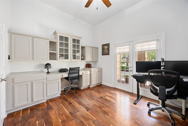 15306 Clearhaven Ct, Cypress, TX 77429 - office space featuring built in desk, ceiling fan, ornamental molding, and dark wood-style flooring