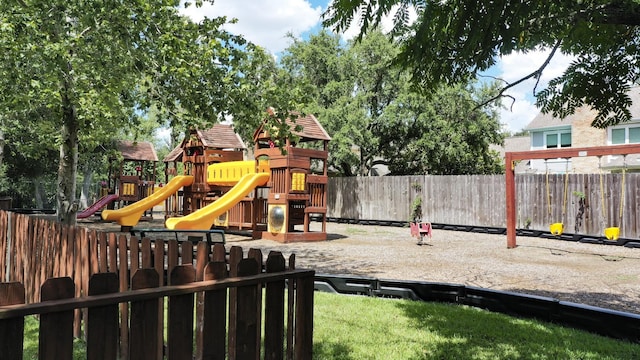 community jungle gym with fence