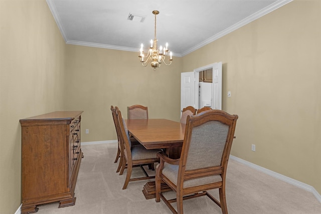 dining room with a chandelier, baseboards, visible vents, and light carpet