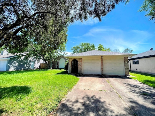 ranch-style house featuring concrete driveway, brick siding, an attached garage, and a front lawn