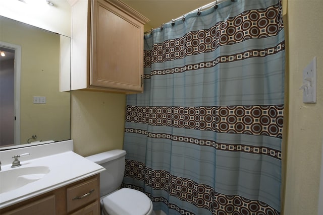 7521 Beaudelaire Cir, Galveston, TX 77551 - full bath featuring vanity, toilet, and a shower with shower curtain