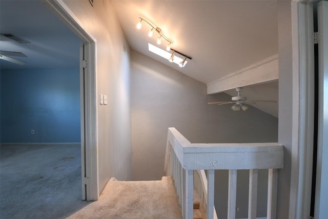 7521 Beaudelaire Cir, Galveston, TX 77551 - corridor with an upstairs landing, vaulted ceiling, and carpet floors