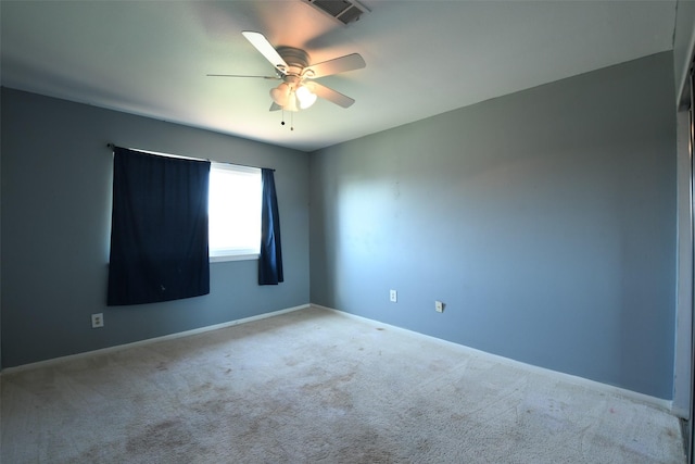 7521 Beaudelaire Cir, Galveston, TX 77551 - carpeted empty room featuring a ceiling fan and baseboards