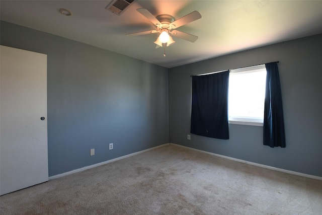 7521 Beaudelaire Cir, Galveston, TX 77551 - carpeted empty room featuring a ceiling fan and baseboards
