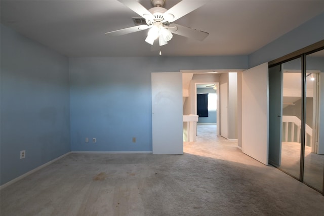 7521 Beaudelaire Cir, Galveston, TX 77551 - unfurnished room with carpet flooring, a ceiling fan, and baseboards