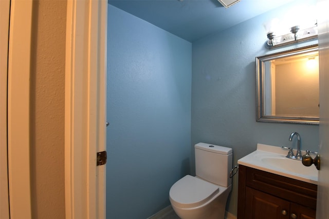 7521 Beaudelaire Cir, Galveston, TX 77551 - bathroom with toilet and vanity