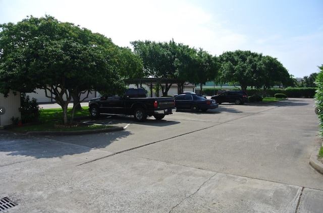 7521 Beaudelaire Cir, Galveston, TX 77551 - view of uncovered parking lot