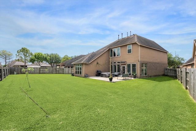 13921 Pebble Falls Ln, Pearland, TX 77584 - rear view of property featuring a patio