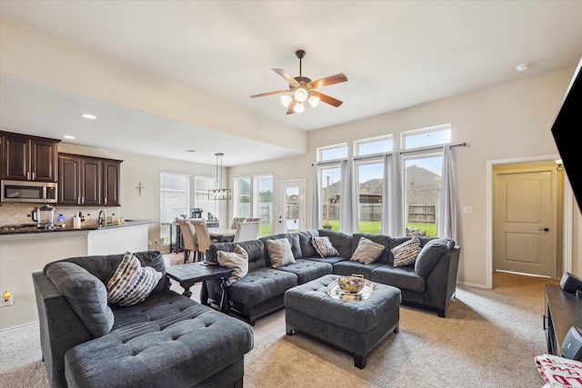 13921 Pebble Falls Ln, Pearland, TX 77584 - living area with ceiling fan, light carpet, recessed lighting, and baseboards