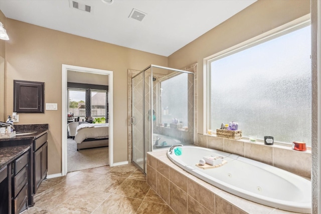 13921 Pebble Falls Ln, Pearland, TX 77584 - bathroom with a stall shower, a tub with jets, vanity, and connected bathroom