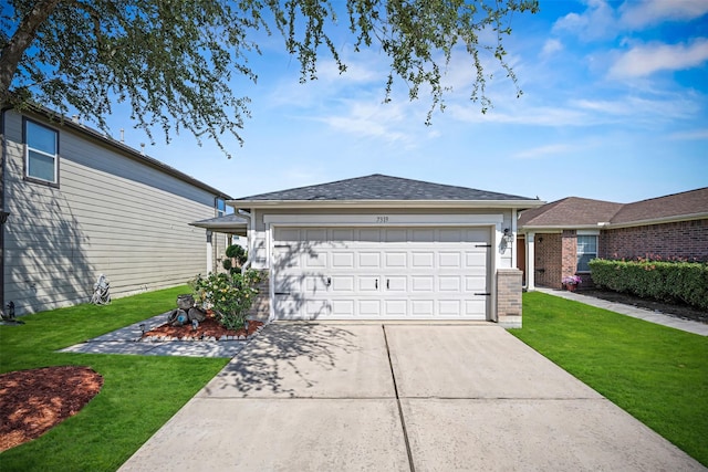ranch-style house with brick siding, an attached garage, a shingled roof, concrete driveway, and a front yard