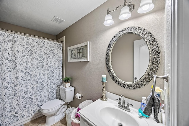 full bathroom with toilet, a shower with curtain, vanity, visible vents, and tile patterned flooring