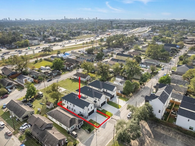 bird's eye view featuring a view of city and a residential view