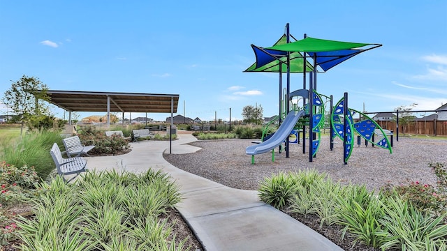 community jungle gym featuring fence