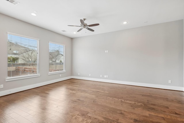 334 Yale Oaks Ln, Houston, TX 77091 - spare room featuring baseboards, wood finished floors, ceiling fan, and recessed lighting