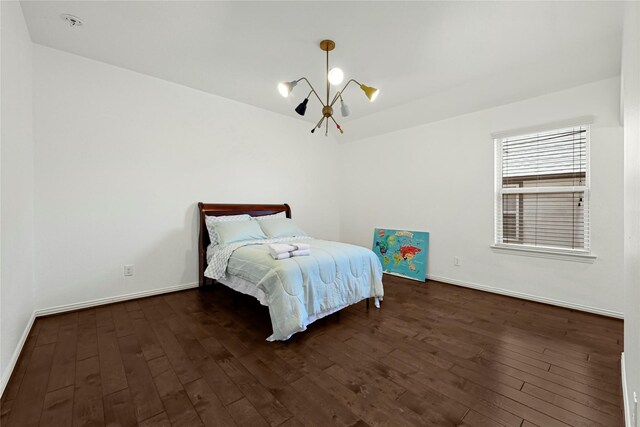 18914 Trinity Star Dr, Cypress, TX 77433 - bedroom with a chandelier, hardwood / wood-style floors, and baseboards