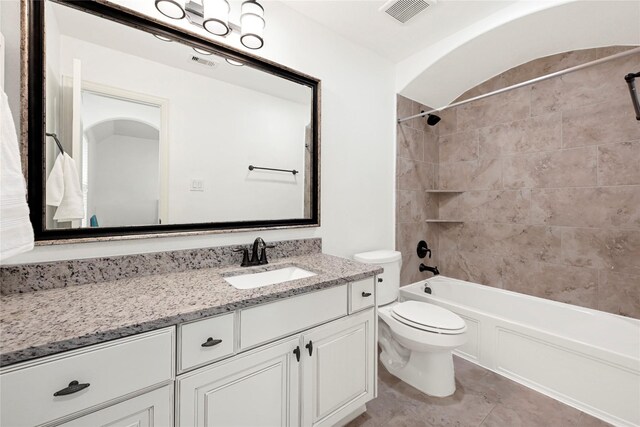 18914 Trinity Star Dr, Cypress, TX 77433 - bathroom with vanity, toilet, shower / bathtub combination, and tile patterned flooring