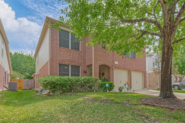 10406 Nickel Grove Dr, Houston, TX 77095 - view of front of property featuring central AC unit, brick siding, driveway, and a garage