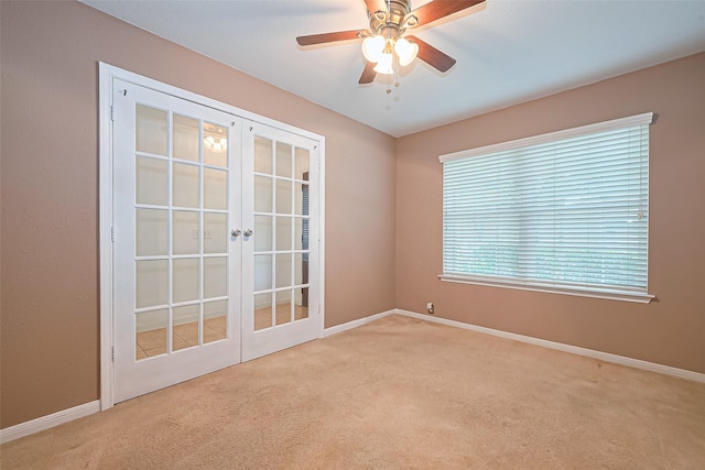 10406 Nickel Grove Dr, Houston, TX 77095 - empty room with carpet flooring, french doors, ceiling fan, and baseboards