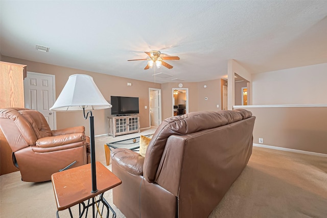 10406 Nickel Grove Dr, Houston, TX 77095 - living area featuring a ceiling fan, baseboards, attic access, and light colored carpet