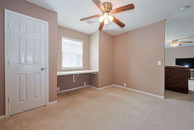 10406 Nickel Grove Dr, Houston, TX 77095 - unfurnished bedroom featuring light colored carpet, baseboards, an office area, and ceiling fan