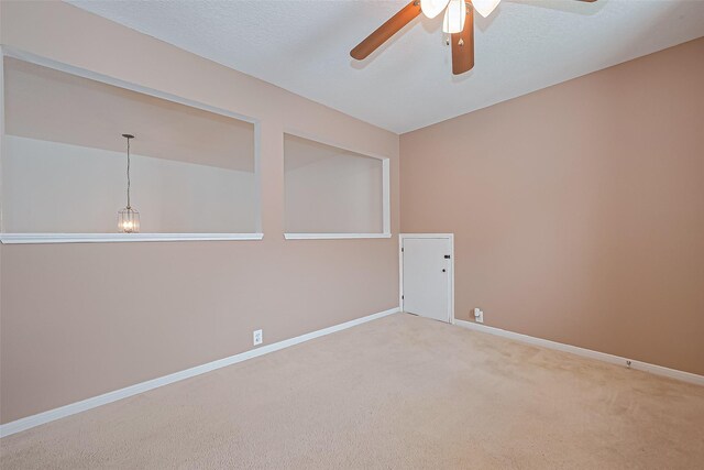 10406 Nickel Grove Dr, Houston, TX 77095 - carpeted empty room featuring a ceiling fan and baseboards