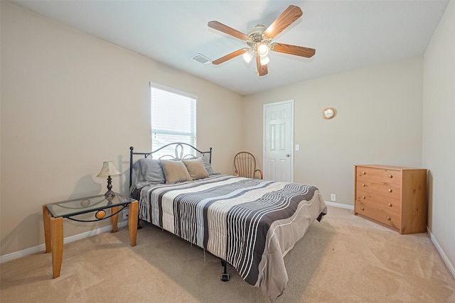 10406 Nickel Grove Dr, Houston, TX 77095 - bedroom featuring baseboards, light carpet, and a ceiling fan