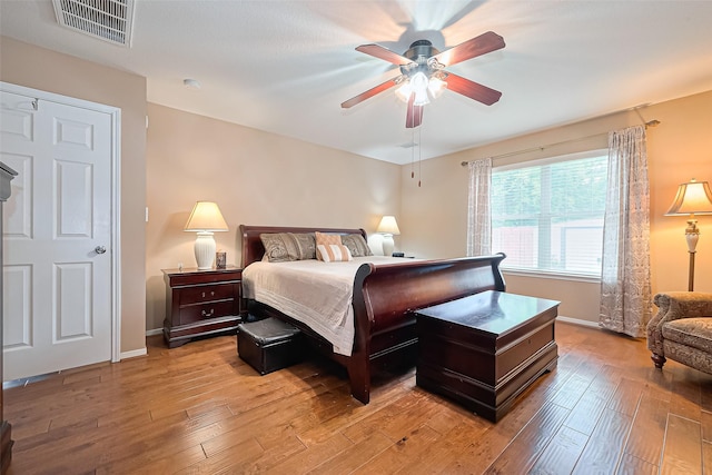 10406 Nickel Grove Dr, Houston, TX 77095 - bedroom featuring light wood-style flooring, baseboards, and ceiling fan