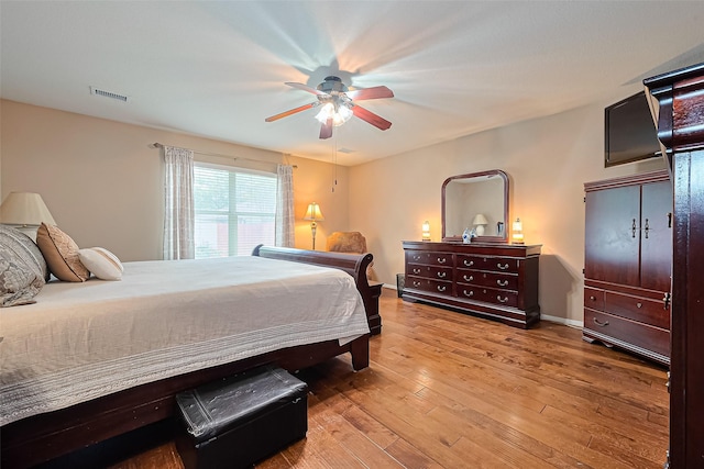 10406 Nickel Grove Dr, Houston, TX 77095 - bedroom featuring wood-type flooring and a ceiling fan