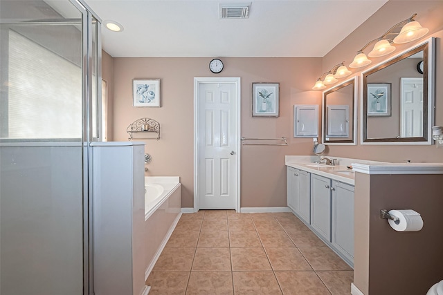 10406 Nickel Grove Dr, Houston, TX 77095 - bathroom featuring tile patterned flooring, a shower stall, a bath, vanity, and baseboards