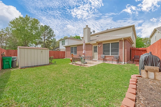 10406 Nickel Grove Dr, Houston, TX 77095 - rear view of property with brick siding, a chimney, a storage unit, a patio area, and an outdoor structure