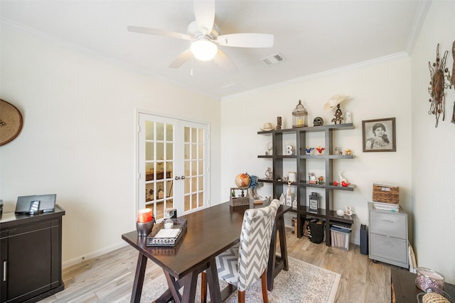 office with french doors, light wood finished floors, crown molding, a ceiling fan, and baseboards