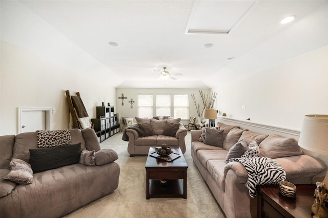 living area with light carpet, a ceiling fan, attic access, and recessed lighting