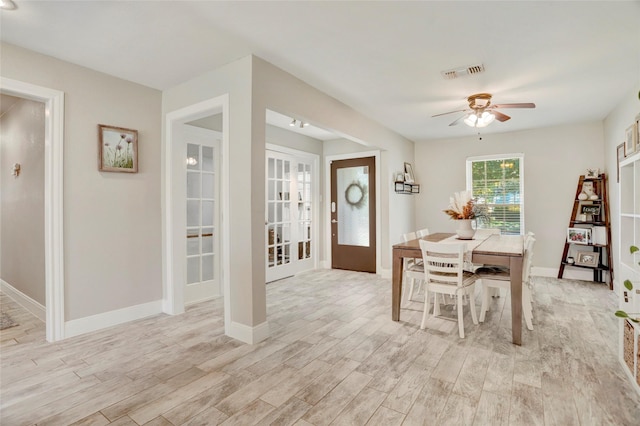 11915 Atwell Dr, Houston, TX 77035 - dining area featuring a ceiling fan, light wood finished floors, and baseboards