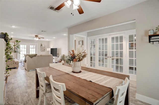 dining area featuring french doors, light wood-type flooring, visible vents, recessed lighting, and a ceiling fan