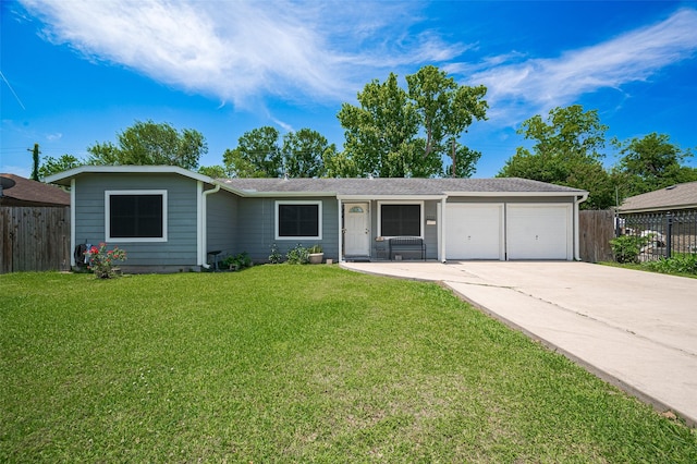 12735 Iroquois St, Houston, TX 77037 - ranch-style home featuring fence, a garage, concrete driveway, and a front yard