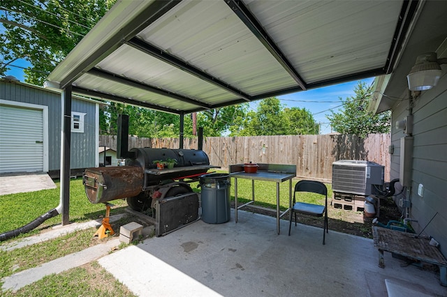 12735 Iroquois St, Houston, TX 77037 - view of patio featuring central AC and fence