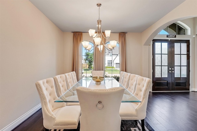 23907 Birchwood Lake Ln, Katy, TX 77493 - dining room with a chandelier, arched walkways, healthy amount of natural light, and french doors