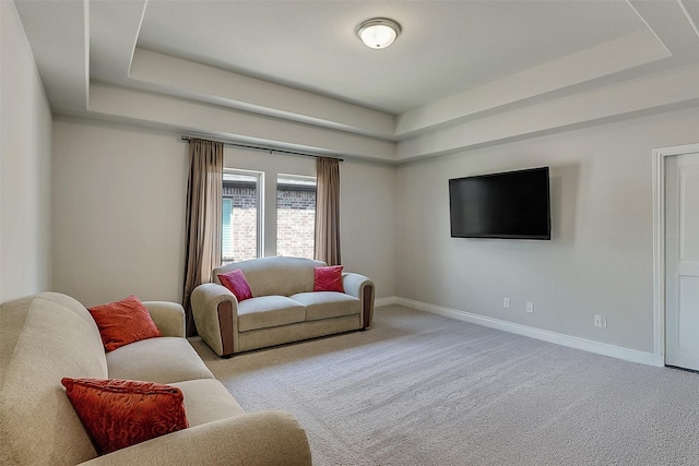 23907 Birchwood Lake Ln, Katy, TX 77493 - carpeted living room with a tray ceiling and baseboards