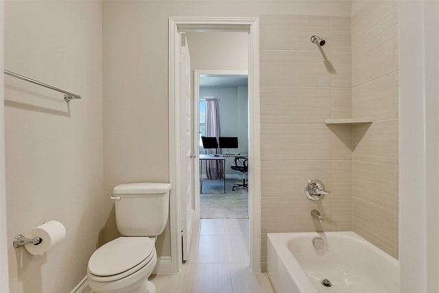 23907 Birchwood Lake Ln, Katy, TX 77493 - bathroom with toilet, washtub / shower combination, tile patterned floors, and baseboards