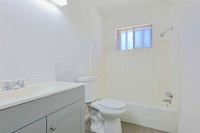 full bath featuring toilet, shower / bathtub combination, vanity, and wood finished floors