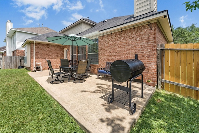 view of patio featuring fence