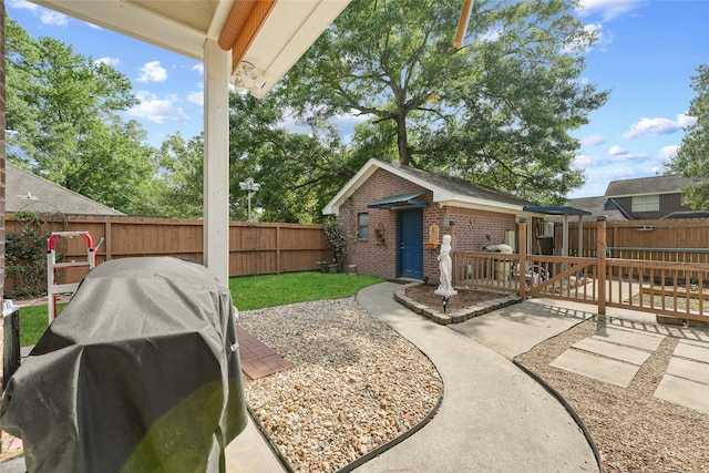 view of patio featuring area for grilling and a fenced backyard