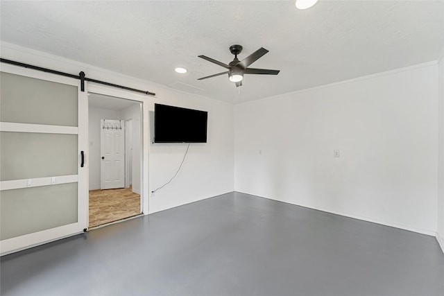 interior space with baseboards, a ceiling fan, and recessed lighting