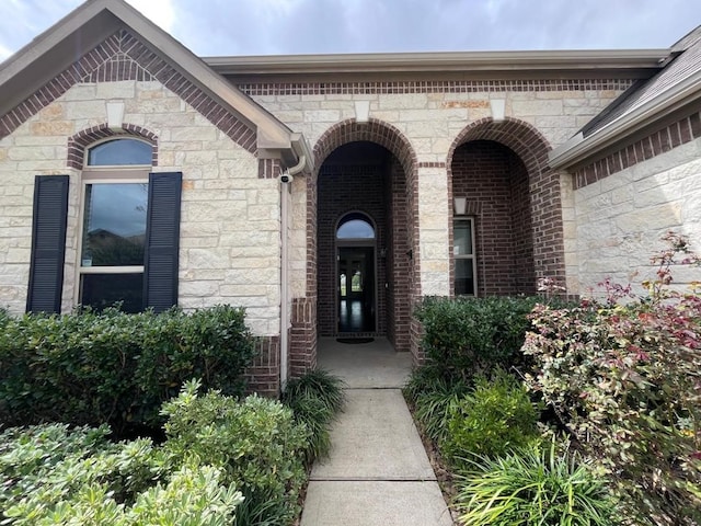 25215 Quiet Run Trl, Richmond, TX 77406 - doorway to property with stone siding and brick siding